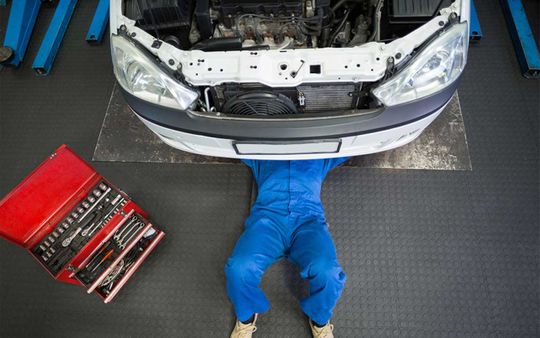 mechanic-fixing-car